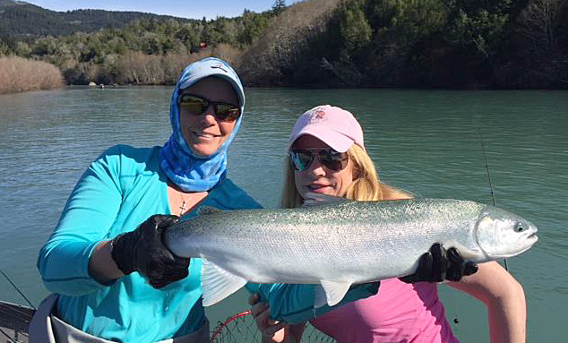 Marty Mullarkey, pictured right, of Half Moon Bay spent Valentine’s weekend with her husband Rob along with guide Val Early, pictured left. The couple had a great time and landed some nice steelhead while fishing the Chetco River. Photo courtesy of Early Fishing Guide Service