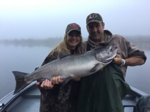 Crescent City resident Trina Gheen, with the help of Jason Costello, pictured right, landed her first-ever Klamath River salmon last week while fishing with guide Mike Coopman. Photo courtesy of Mike Coopman’s Guide Service